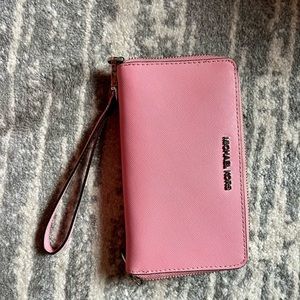 Michael Kors light pink wristlet with attached phone holder